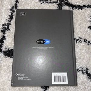 cosmetology barbering text book.